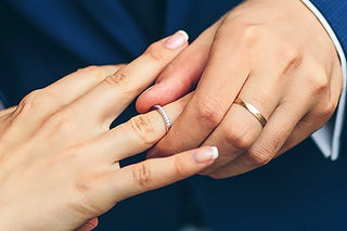 Why is the wedding ring worn in the left hand?