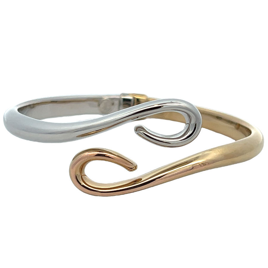 Two-tone 14 Karat Hinged Swirl Bypass Bangle