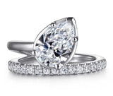 Lady's White 14 Karat Pear Shape Wrap Ring Size 6.5 17 = 0.31tw Round