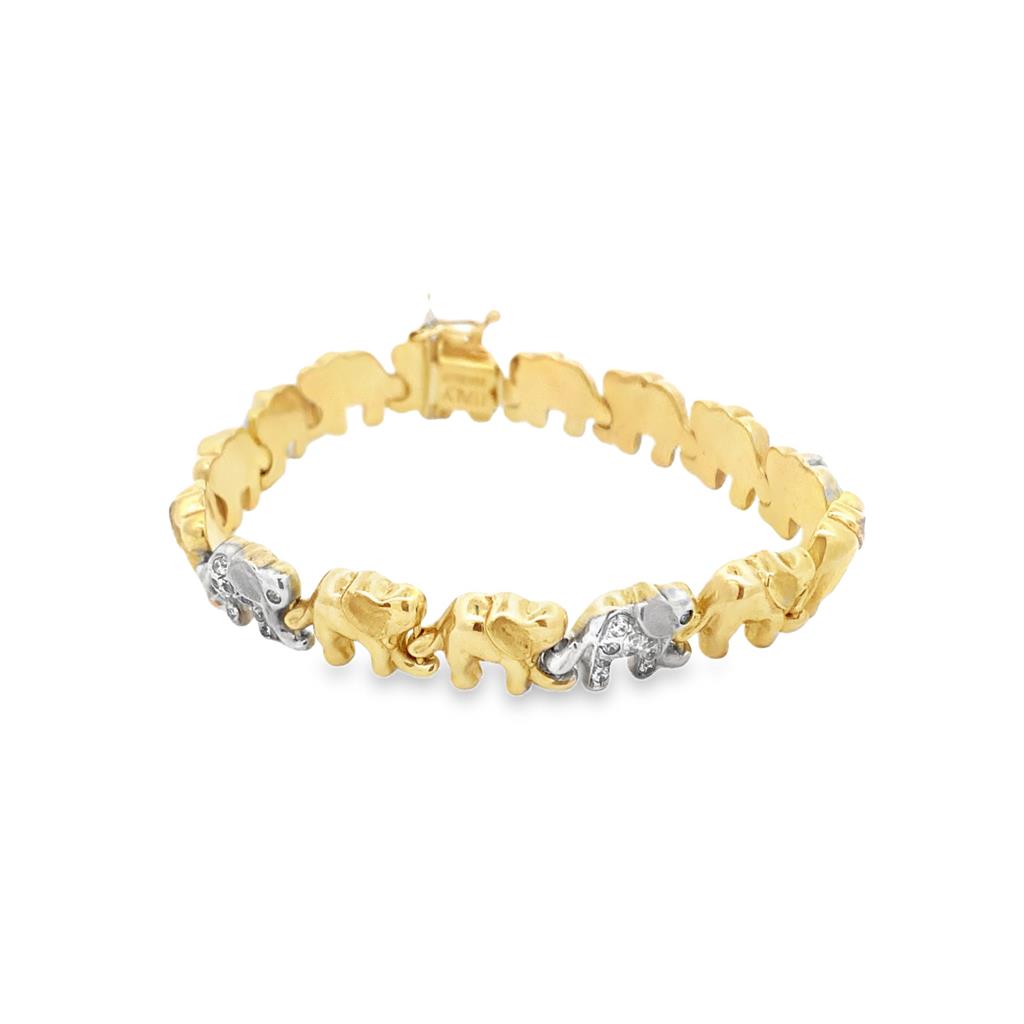 Estate Elephant Link Bracelet containing 50 accent diamonds, approx. .56ctw, SI2/IJ, approx. 7" long w hidden box clasp and figure-eight safety
Gram Weight: 19.2