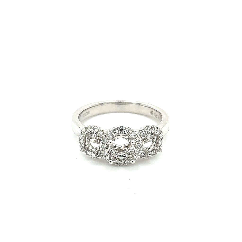 Lady's White 18 Karat Three Stone Halo Ring