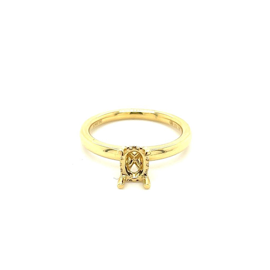 Lady's Yellow 18 Karat Oval Hidden Halo Ring