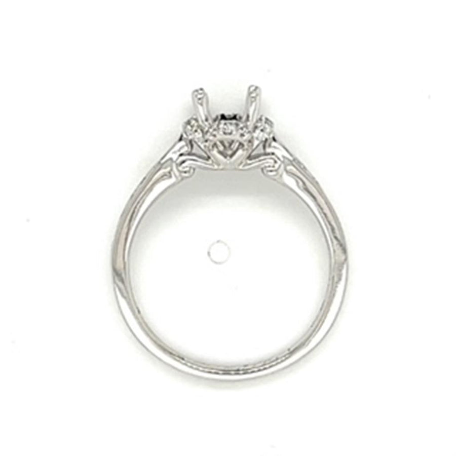 Lady's White 18 Karat Oval Halo Ring