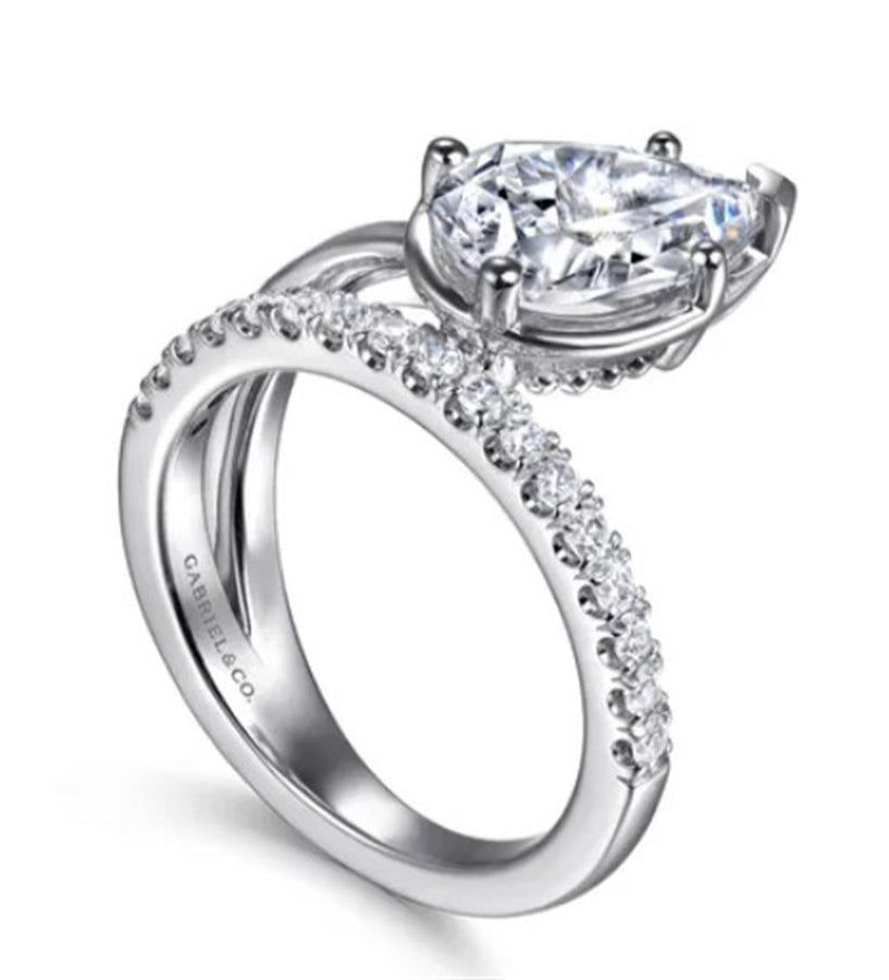 Lady's White 14 Karat Pear Shape Wrap Ring Size 6.5 17 = 0.31tw Round