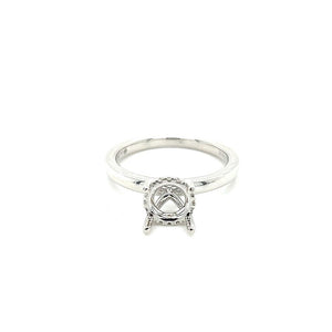 Lady's White 18 Karat Hidden Halo Ring