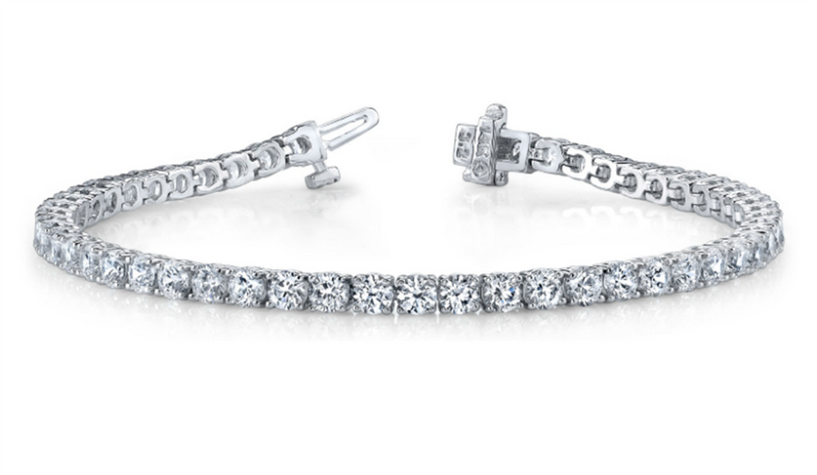 Lady's Platinum 4-Prong Tennis Bracelet With 65 = 4.00Tw Round G/H Vs1