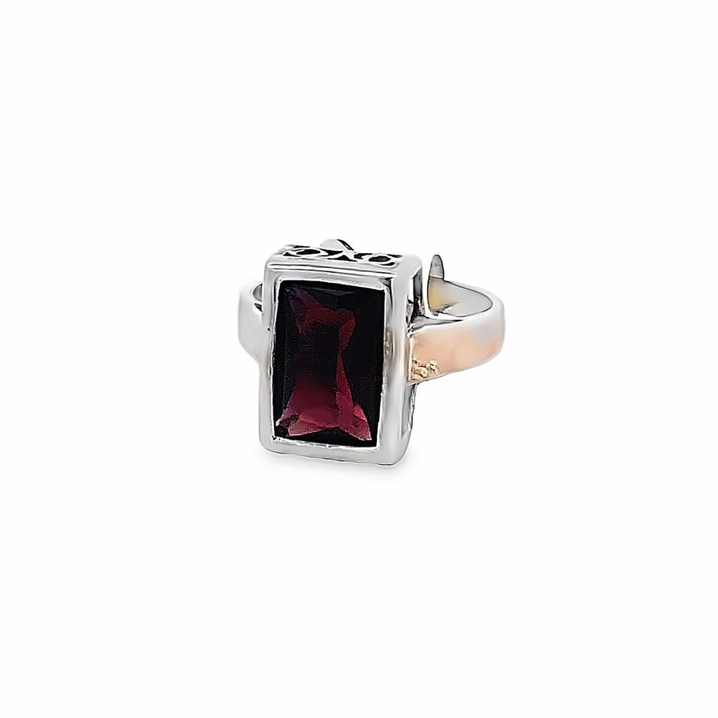 Emerald cut bezel rhodolight garnet