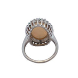 Oval Cabochon White Crystal Opal Emerald and Diamond Ring