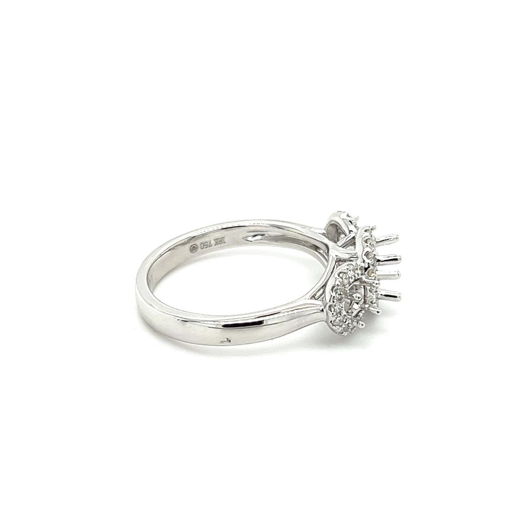 Lady's White 18 Karat Three Stone Halo Ring