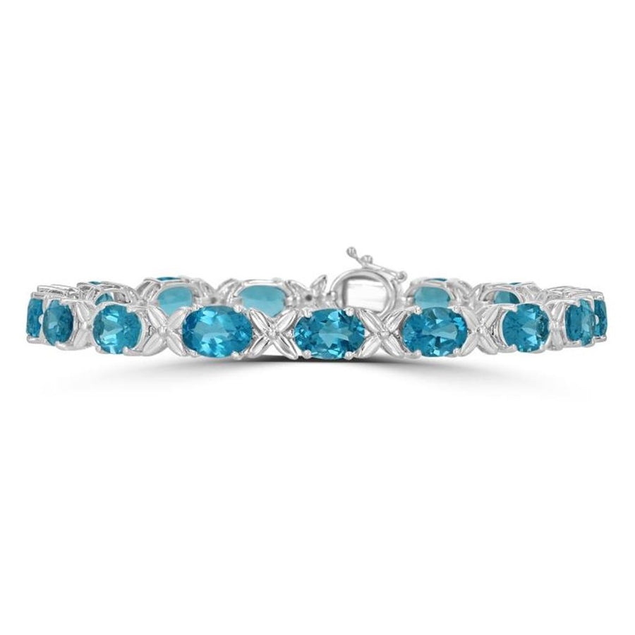 White 14 Karat X Link Bracelet With 15=14.21Tw Oval Blue Topazs