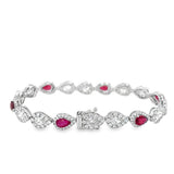 White 18 Karat Pear Halo Bracelet Length 6.5 6 = 3.35tw Pear Rubies
1