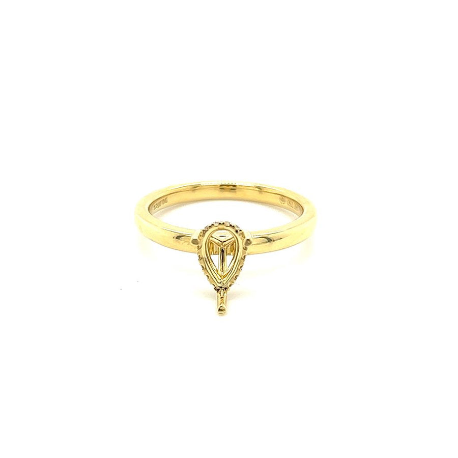 Lady's Yellow 18 Karat Pear Hidden Halo Ring