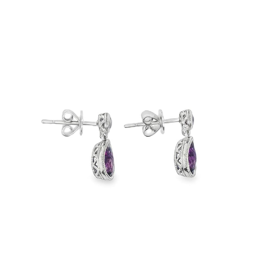 Lady's White 14 Karat Earrings 2=1.18tw P/S Amethyst
2=0.23tw Round A