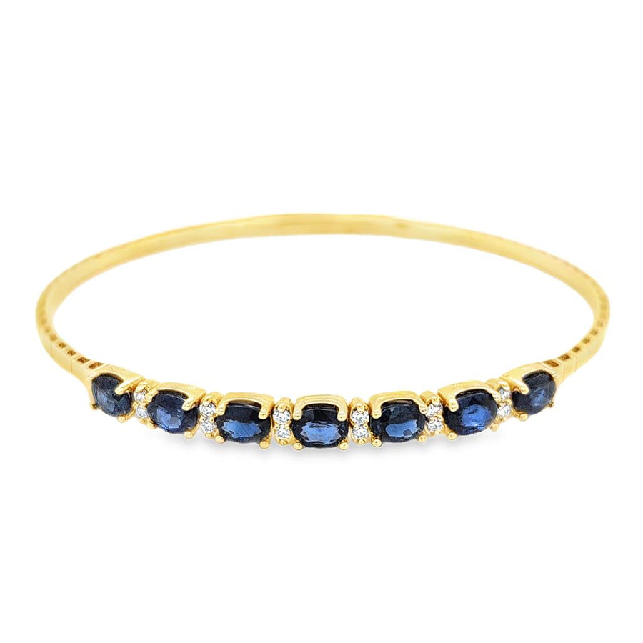 Yellow 14 Karat Bangle Bracelet 7 = 3.14TWT Oval Sapphires
12 = 0.22T