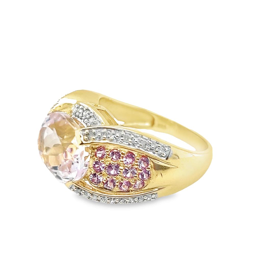 Yellow 14 Karat Semi-Halo Kunzite Fashion Ring With Diamond Acceents Estate Jewelry one 12.00x10.00mm Oval Kunzite
26=0.19tw Round Diamonds
24=1.50x1.50mm Round Kunzites Gram Weight: 7.73