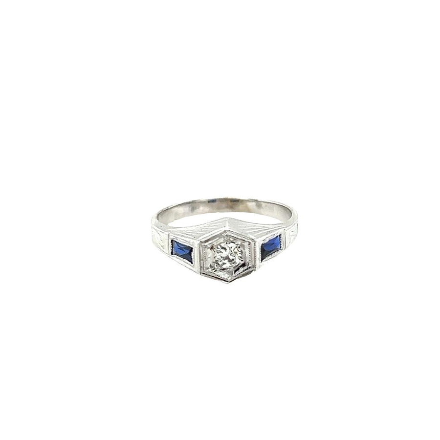 White 14 Karat Diamond Sapphire Textured Baby Ring Estate Jewelry Size 0.5 one 0.10ct Round Diamond
2=3.00x1.50mm Baguette Sapphires Gram Weight: 1.34