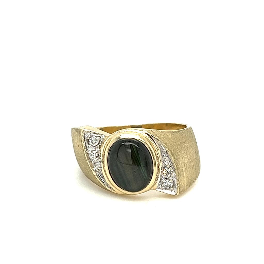 Estate Yellow 14 Karat Satin Bypass Ring with 4=0.05Tw Round Single Cut Diamonds And One 9.00X7.00Mm Cabochon Genuine Black Star Sapphire. 
Gram Weight: 7.1