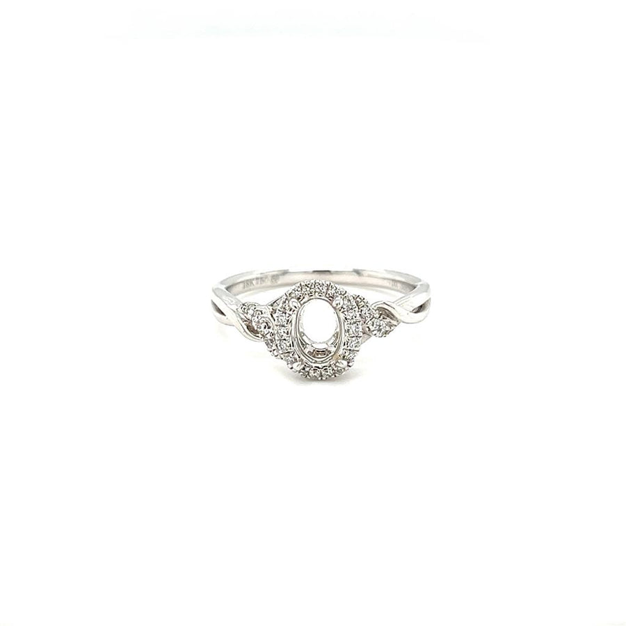 Lady's White 18 Karat Swirl Oval Halo Ring