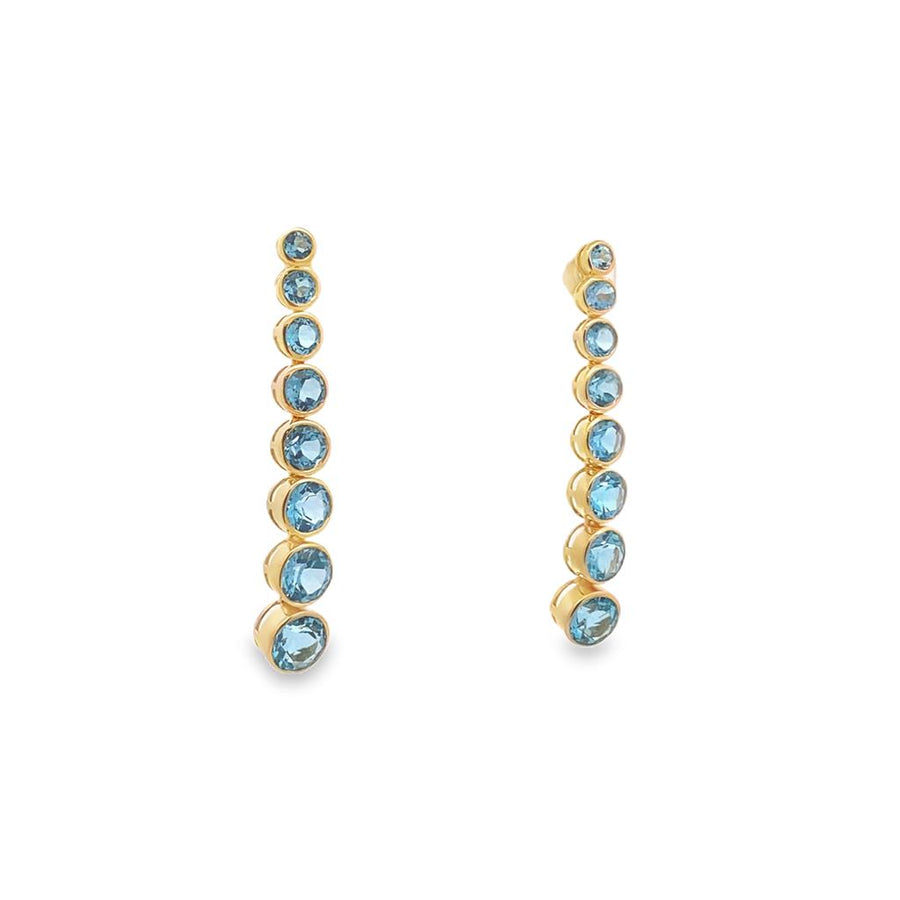 Yellow 14 Karat 46.50mm Elongated Graduated Bezel Set Swiss Blue Topaz