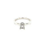 Lady's White 18 Karat Oval Hidden Halo Ring