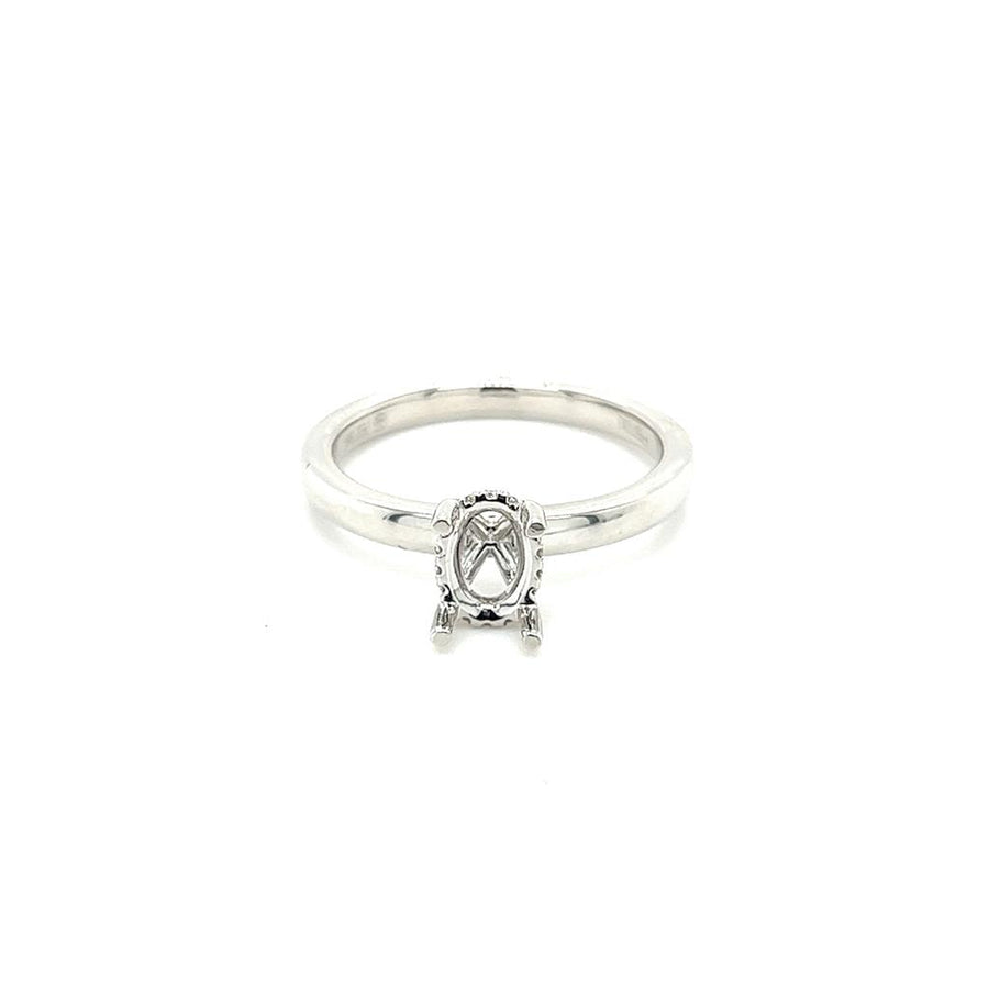 Lady's White 18 Karat Oval Hidden Halo Ring